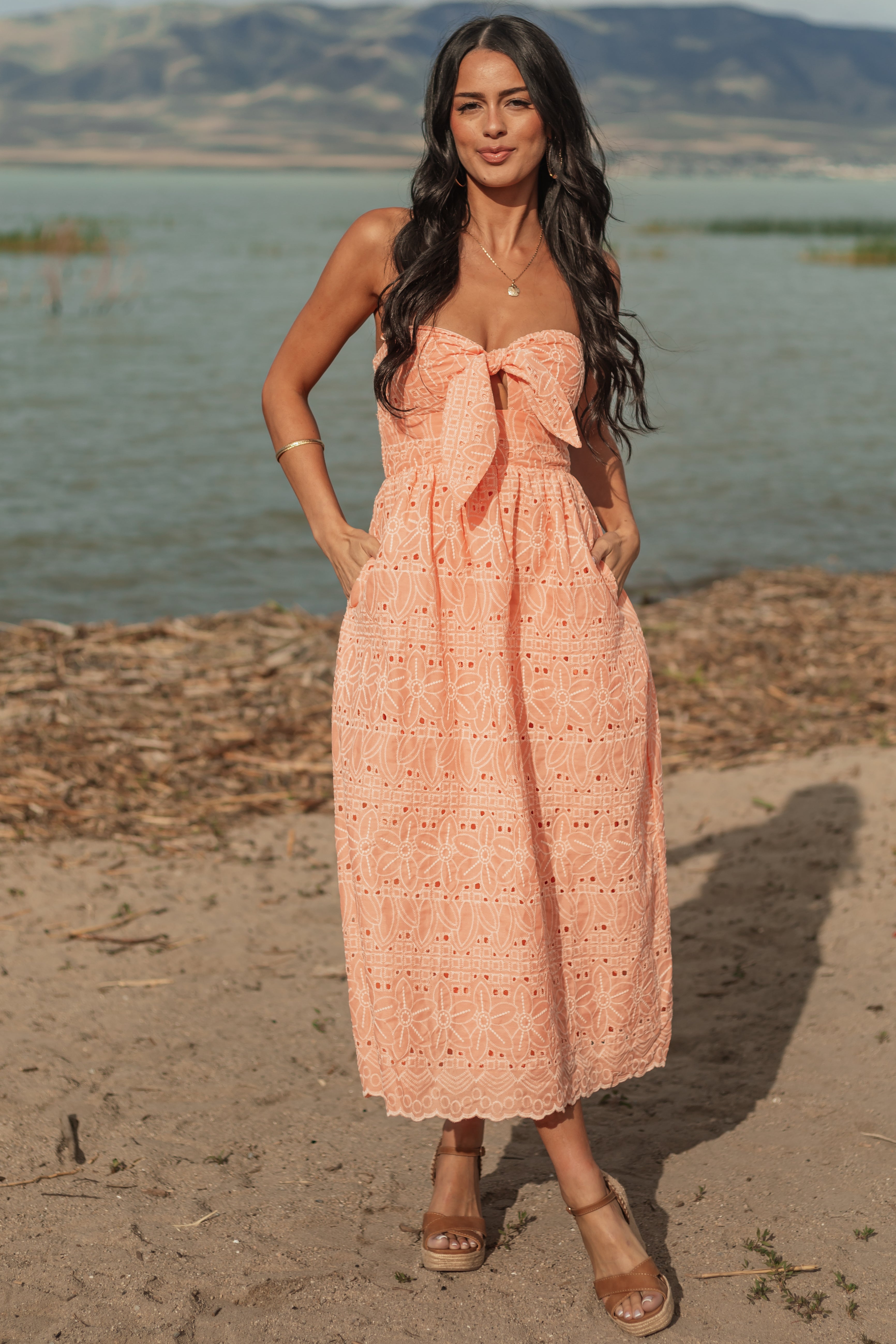 Peach-Strapless-Eyelet-Front-Tie-Midi-Dress-front_05202025_6e3e4635-d78d-48db-a4de-0693ba846658